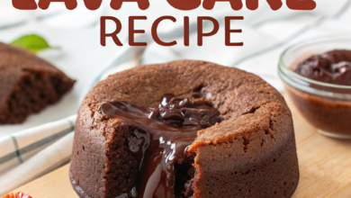 A decadent chocolate lava cake on a plate, featuring a gooey molten center with fresh berries and powdered sugar.