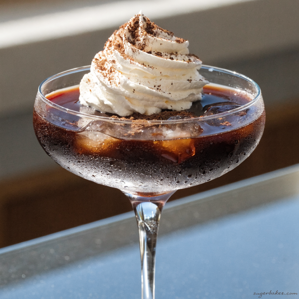 Godiva chocolate martini in a glass with chocolate shavings.
